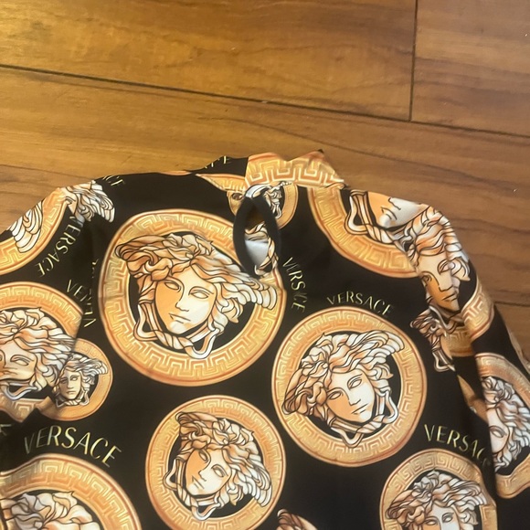 Versace Black and Gold One Piece bodysuit - Picture 3 of 5